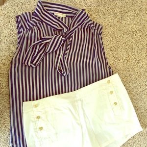 Blue and white striped blouse.